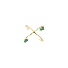 Yellow gold ring with pear-cut emeralds on a white background