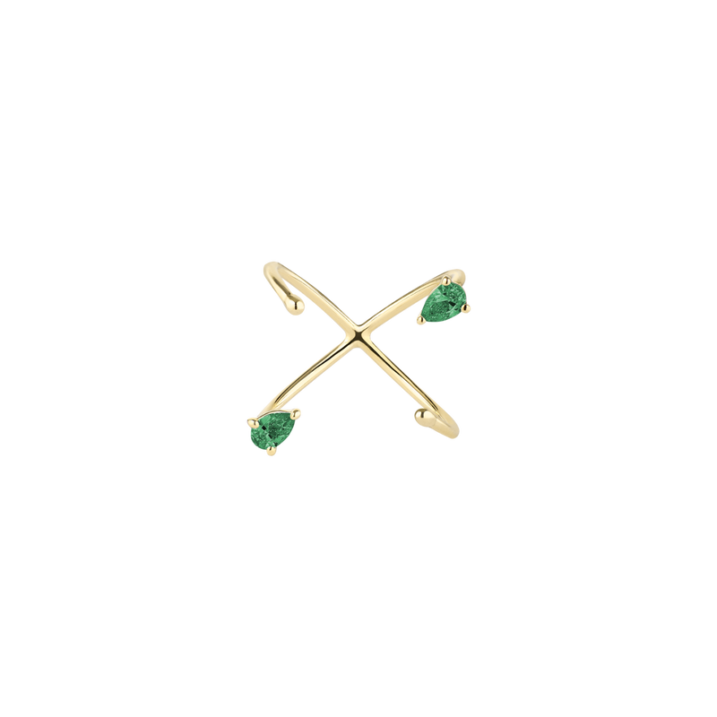 Yellow gold ring with pear-cut emeralds on a white background