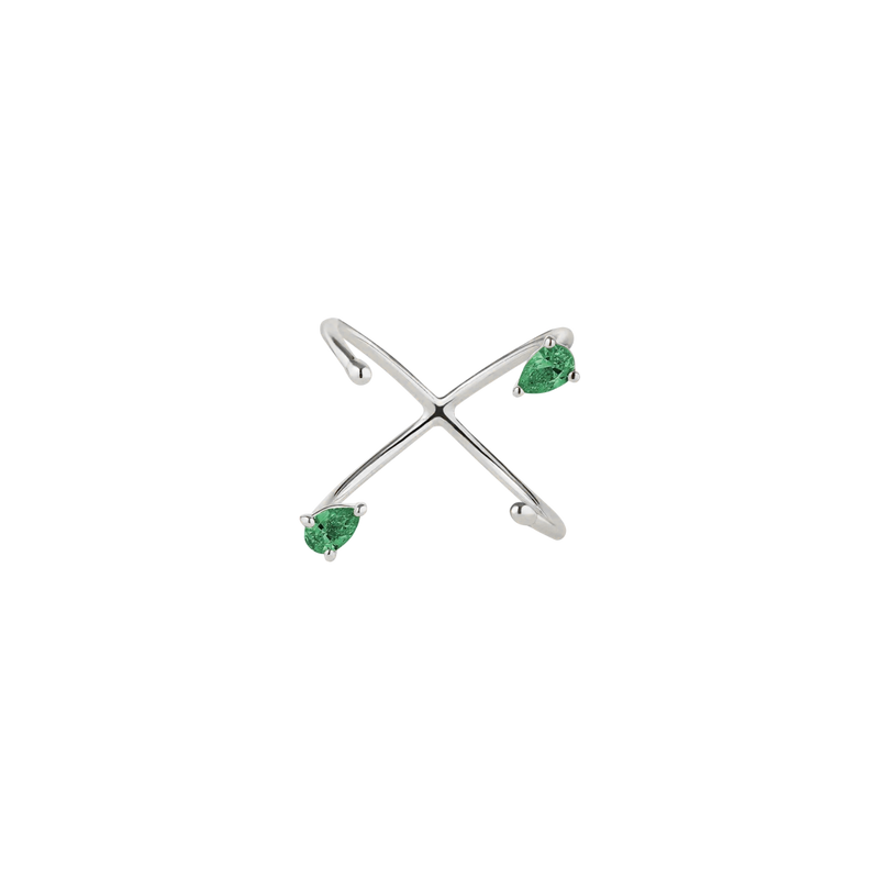 White gold ring with pear-cut emeralds on a white background