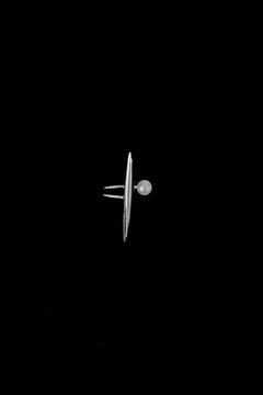Lera Treyger Gyosho silver ring with pearl photographed on dramatic black background