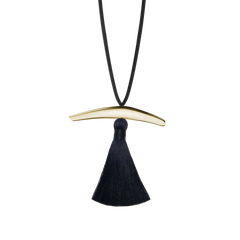 Lera Treyger Dai Pendant in 14k yellow gold - curved calligraphy-brush bar with black silk tassel on black cord, studio cutout